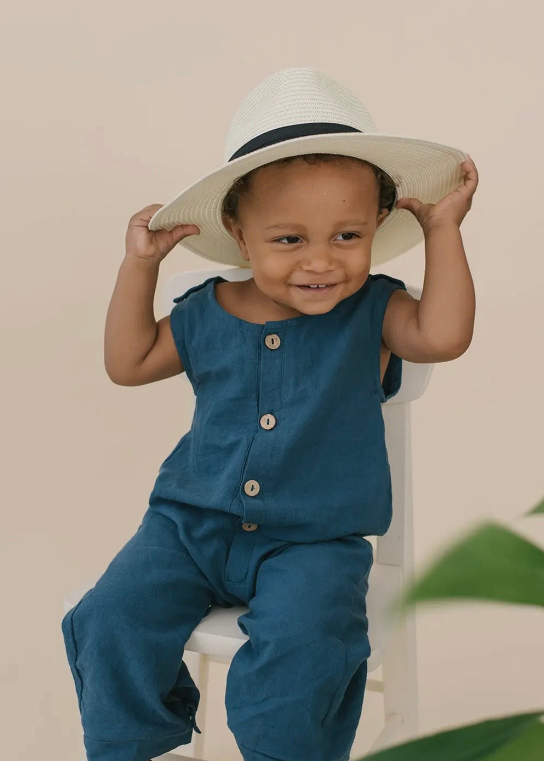 Slate Blue Button Romper by The Honey and Bro Co. - Back View