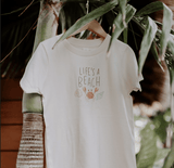 Life's a Beach Graphic Tee by Finn + Emma - Flat Lay - Organic Cotton Toddler Tee