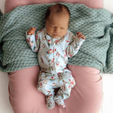 White Rabbit Organic Cotton Zip Footie Sleepsuit by Snuggle Hunny - Side View - Easter Baby Clothing