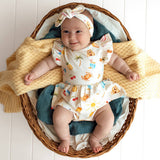 Baby girl wearing Beach Fun organic cotton dress