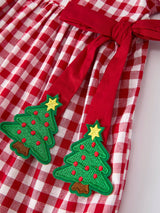 Girls' Red Plaid Christmas Dress with Tree Bow Accents by Rylee Faith Designs - Lifestyle View