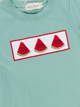 Close-up of smocked bodice with embroidered watermelon detail on toddler boy cotton outfit