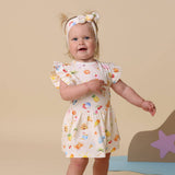 Snuggle Hunny Beach Fun dress on child outdoors