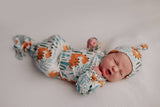 Dinosaur Zoo Knotted Gown by Three Little Tots - On Model - Newborn Baby Clothing