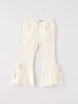 WHITE BELL BOTTOM DENIM PANTS by Rylee Faith Designs - Front View - Easter Baby Clothing