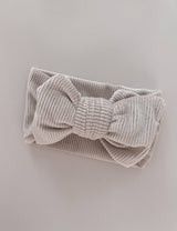 Chunky Velvet Ribbed Bow Headband | Cream by Petite + Co - Back View