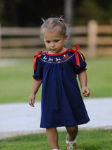 Navy Christmas Dress with Santa Sleigh | Festive Holiday Celebration Outfit for Girls by Rylee Faith Designs - Back View