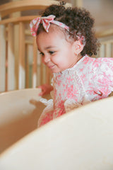 Pink Rose Print Baby Girl Romper with Headband Set by The Honey and Bro Co. - Back View