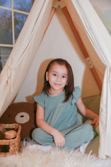 Charlotte Sage Organic Muslin Sleeveless Dress by The Honey and Bro Co. - Lifestyle View