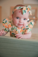 Sunny Citrus Organic Cotton Frill Bodysuit | Baby Girl by The Honey and Bro Co. - Back View