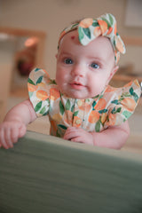 Sunny Citrus Organic Cotton Frill Bodysuit | Baby Girl by The Honey and Bro Co. - Detail View