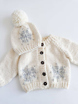 Snowflake Hand-Knit Baby Cardigan by The Honey and Bro Co. - Lifestyle View