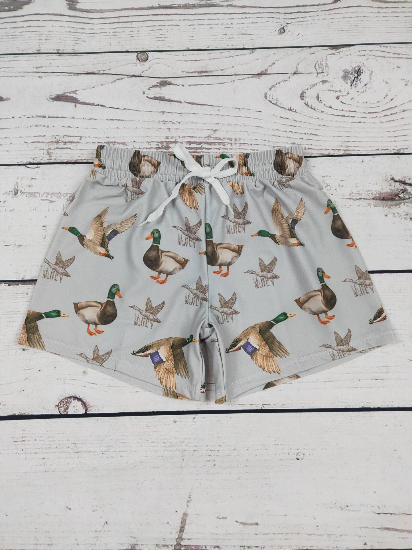 Boys Grey Mallard Printed Boardshorts by The Honey and Bro Co. - Front View