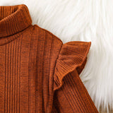 Toddler Solid Color Flutter Sleeve Dress by The Honey and Bro Co. - Lifestyle View