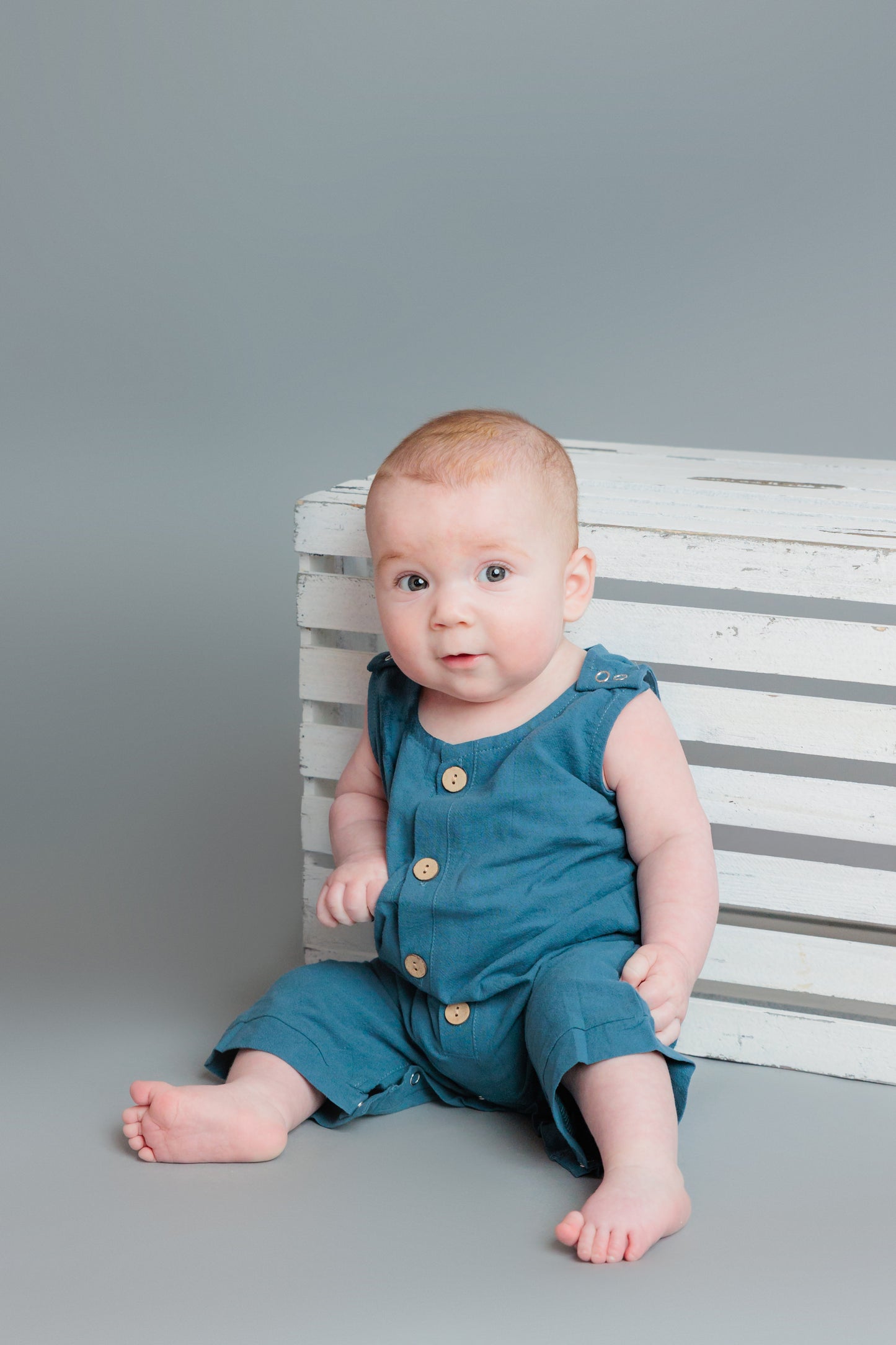 Slate Blue Button Romper by The Honey and Bro Co. - Front View