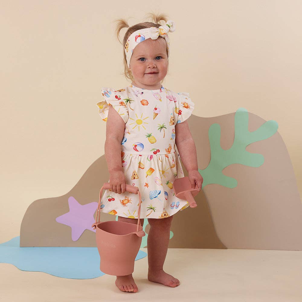 Beach Fun print organic cotton short sleeve dress for baby girl front view