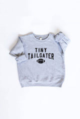 Tiny Tailgater Graphic Sweatshirt | Green Toddler Unisex by The Honey and Bro Co. - Lifestyle View