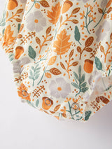 Autumn Floral Smocked Bubble Romper - Detail Snap Closure and Ruffled Leg Openings