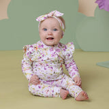 Isla Organic Snugglesuit with Frill - Lifestyle View on Baby