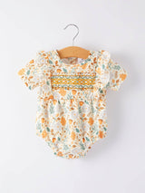 Autumn Floral Smocked Bubble Romper - Front View on Hanger - Fall Botanical Print Baby Girl Romper