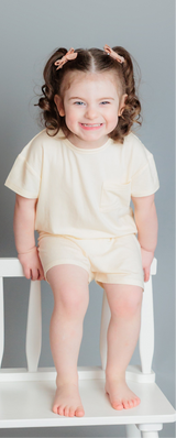 Bamboo Ribbed Cream Toddler Slouchy Short Set by The Honey and Bro Co. - Front View