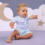 Taking Flight airplane bodysuit in Up Above Collection setting