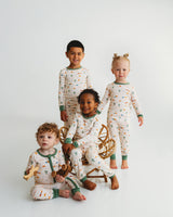 Baby in Desert Dawn Soluna bamboo zippy with older children in matching pajama sets