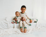 Babies in Desert Dawn Soluna bamboo zippies with older sibling in matching pajama set