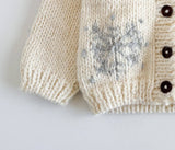 Snowflake Hand-Knit Baby Cardigan by Figgy Friends - Back View