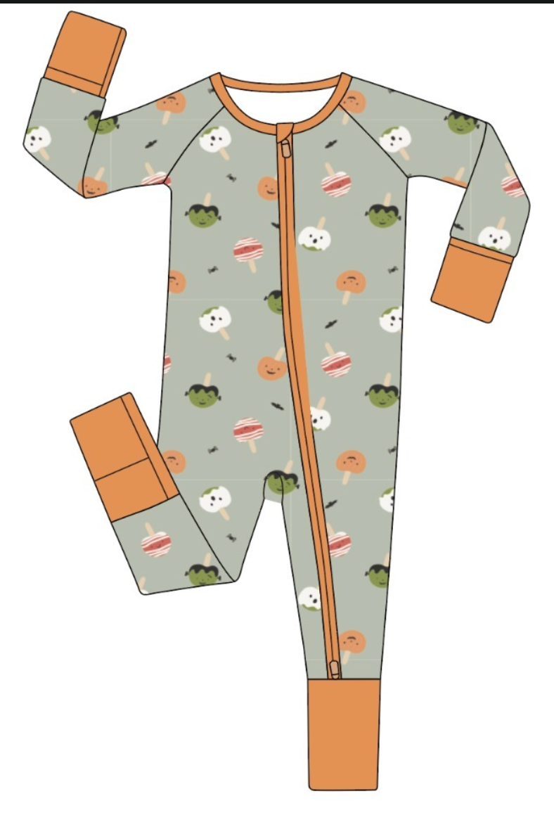 Monster Munch Zinza convertible zippy pajama product view with sage Halloween treat print and orange trim