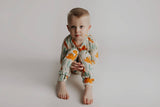 Dinosaur Modal Toddler Two-Piece Pajama Set by Three Little Tots - Styled View