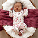 Cherry Blossom Organic Growsuit - Lifestyle View on Baby