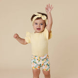 Sunny Citrus lemon print organic cotton bike shorts for toddler front view