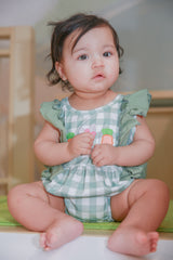 Baby girl model Logan wearing Gingham Carrot Patch Embroidered Bubble Romper - Easter outfit