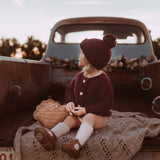 Plum Garter Stitch Beanie Hat by The Honey and Bro Co. - Lifestyle View
