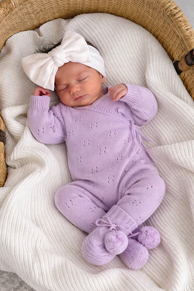 Pointelle long romper in orchid purple for baby, front view showing delicate pointelle knit pattern and side tie