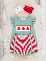 Close-up of ruffle smocked bodice with embroidered watermelon detail on toddler girl cotton outfit
