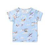 Flat lay of Taking Flight light blue organic cotton baby t-shirt showing watercolor vintage biplane and helicopter print with clouds and stars