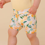 Toddler wearing Sunny Citrus organic cotton bike shorts outfit