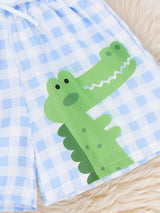 Back view of Gingham Gator Splash Trunk showing green gingham pattern and functioning pockets on boy swim trunks