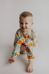 Dinosaur Modal Toddler Two-Piece Pajama Set by Three Little Tots - Side View