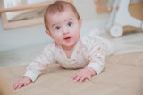 Baby girl model Logan wearing Bicycles Footless Sleep and Play Organic Cotton - vintage bicycle print