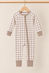 Mocha Gingham Zinza™ Convertible Zippy Pajama on wooden hangers against a warm cream background