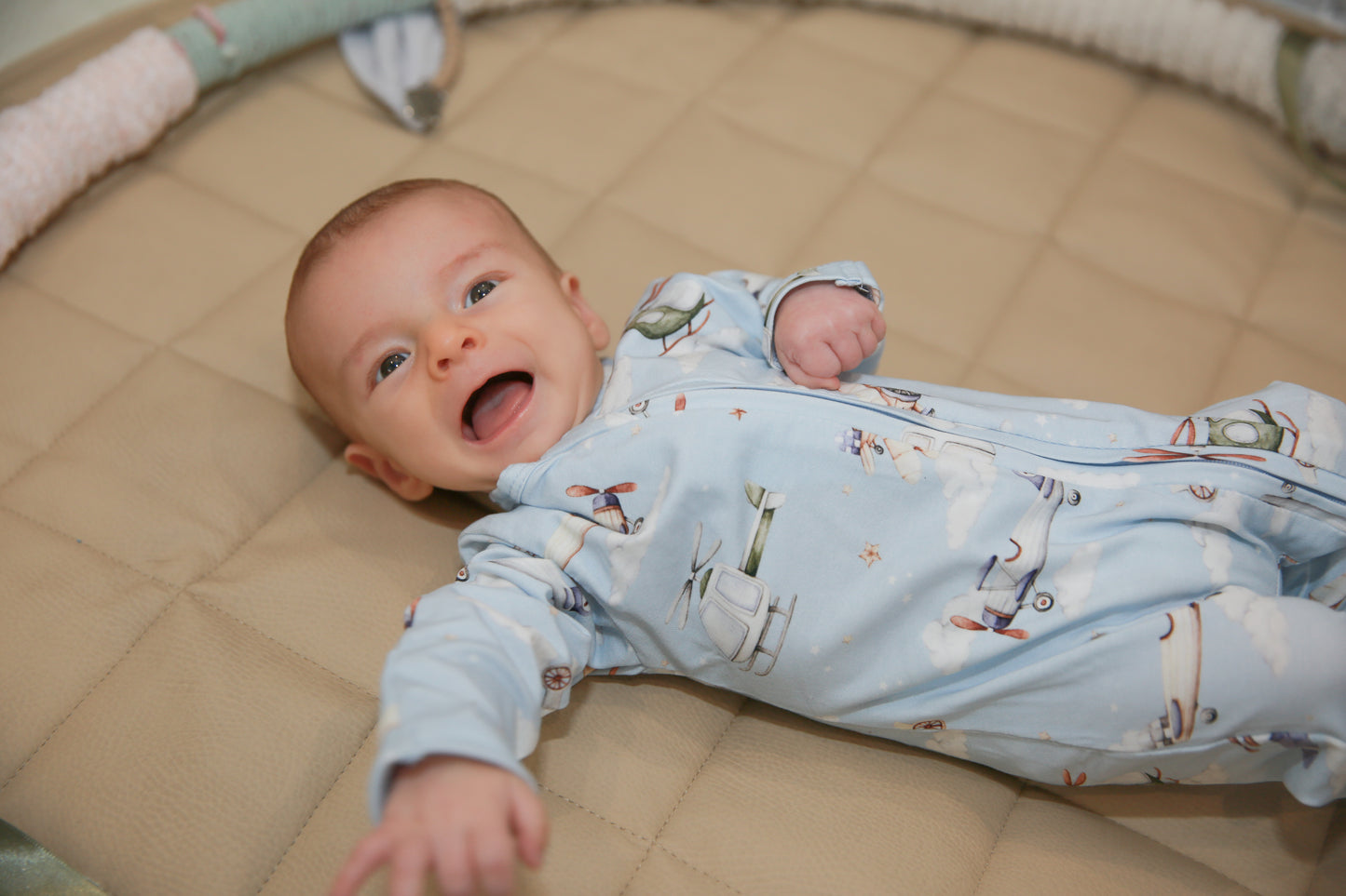 Taking Flight Organic Snugglesuit - Baby Model Sitting Pose