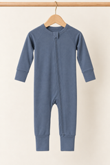 Winter Slate Zinza™ Convertible Zippy Pajama on a wooden hanger against a warm cream background